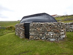 Old boat as roof  by the croft