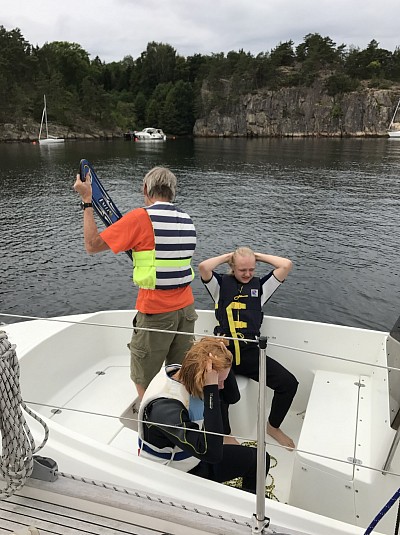 Long hair locks get bound up - and the boys are ready for water skiing!